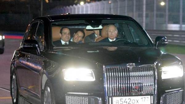 الرئيس السيسي وبوتين يستقلان سيارة الرئاسة الروسية آوروس- صورة أرشيفية