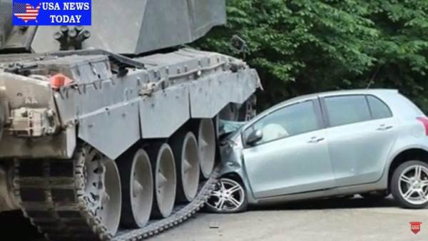 دبابة تدهس سيارة